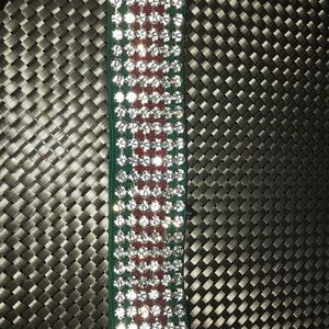 Headband missing one rhinestone can’t really tell.